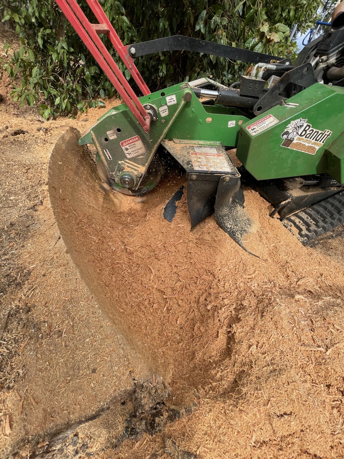 Tree stump removal equipment in action